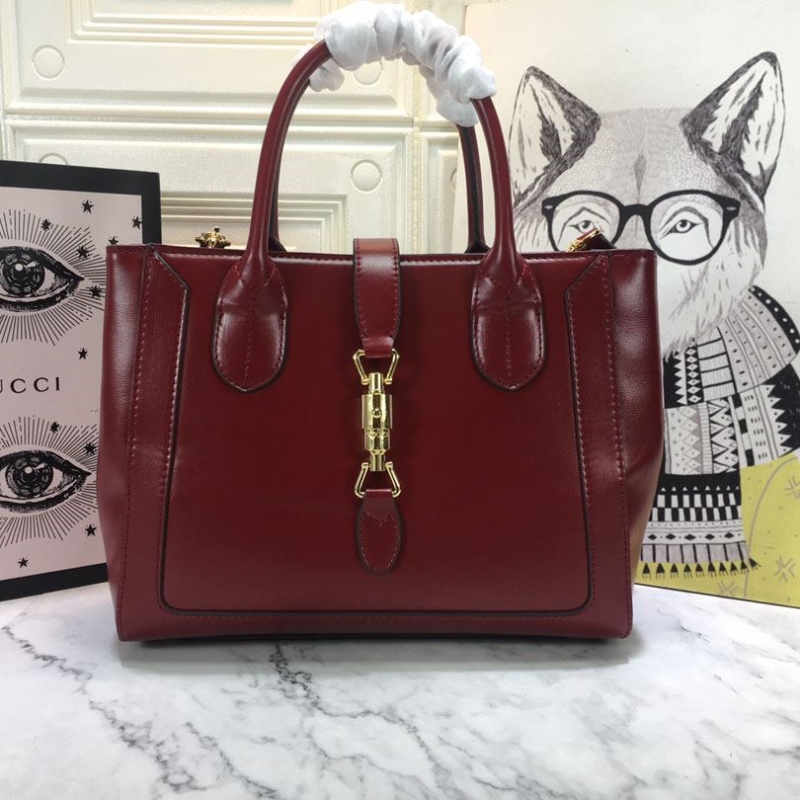 G*u*i shopping bags